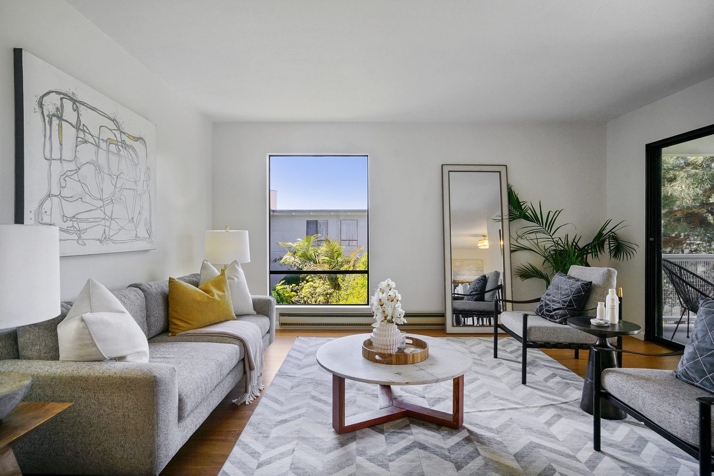 Emeryville condo living room with large windows