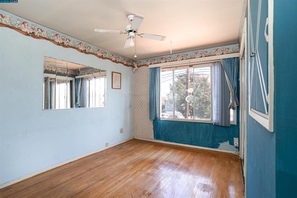 Distressed secondary bedroom