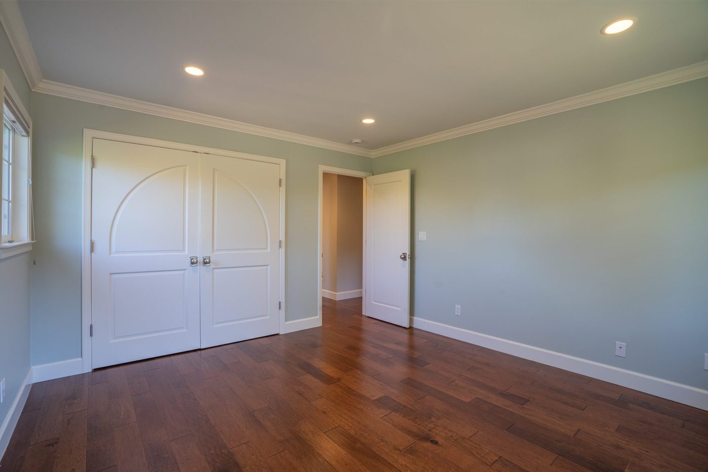 One of four bedrooms with large walk-in closets