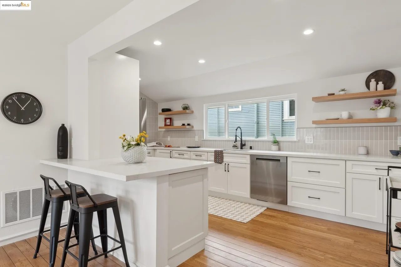 Kitchen with counters, quartz, and breakfast area